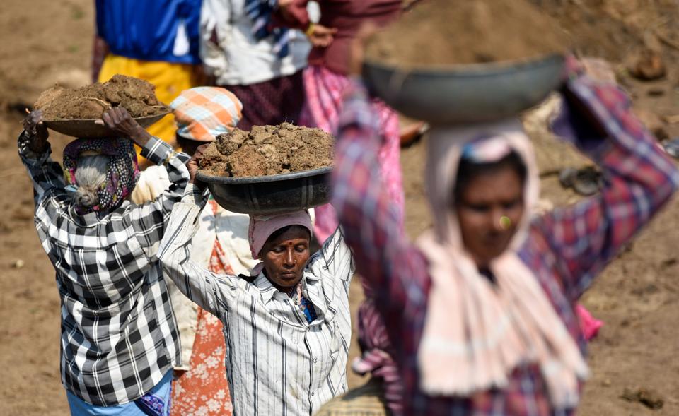 Women working at a lake rejuvenation project at Mandya, Karnataka.